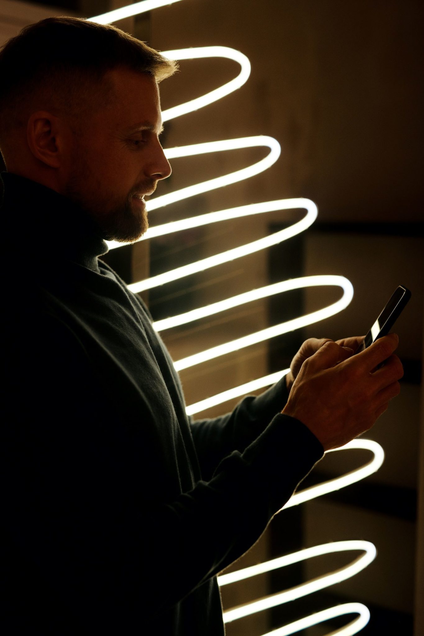 pexels-nicole-michalou-5779179 Man using social media on mobile